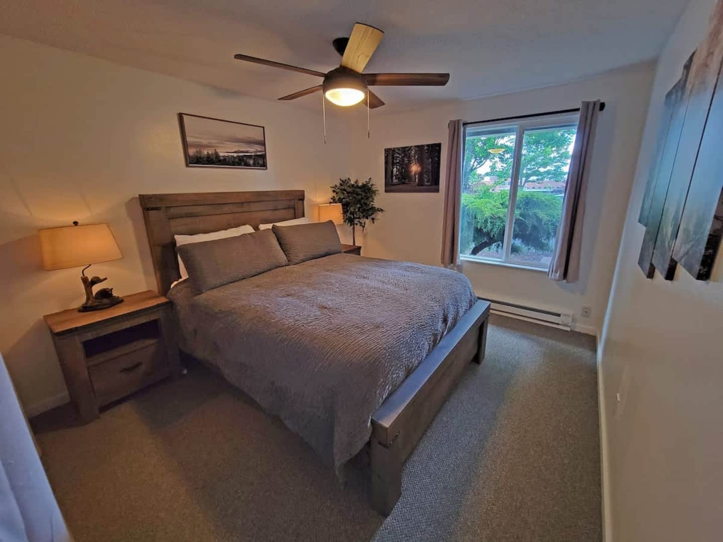 Unwind in the master bedroom, a true sanctuary with a queen bed, where the theme is a delightful camping, forest, and woods-inspired haven. Experience a retreat that brings the great outdoors inside!